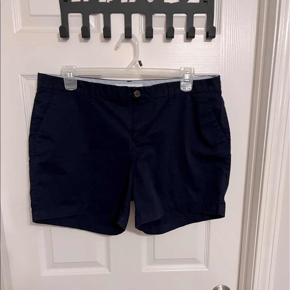 Navy blue shorts with pockets and belt loops.  5 inch inseam.